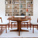 Table à manger ovale extensible en teck, design danois mid century années 60, piètement central et rallonges intégrées