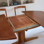 Table à manger ovale extensible en teck, design danois mid century années 60, piètement central et rallonges intégrées