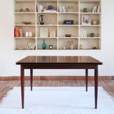 Table à manger scandinave extensible en palissandre, design danois mid-century des années 60, plateau en excellent état.