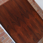 Table à manger scandinave extensible en palissandre, design danois mid-century des années 60, plateau en excellent état.