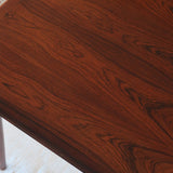 Table à manger scandinave extensible en palissandre, design danois mid-century des années 60, plateau en excellent état.