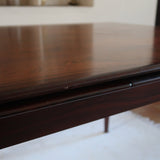 Table à manger scandinave extensible en palissandre, design danois mid-century des années 60, plateau en excellent état.