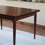 Table à manger scandinave extensible en palissandre, design danois mid-century des années 60, plateau en excellent état.