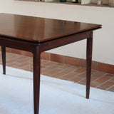 Table à manger scandinave extensible en palissandre, design danois mid-century des années 60, plateau en excellent état.