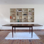 Table à manger scandinave extensible en palissandre, design danois mid-century des années 60, plateau en excellent état.