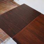 Table à manger scandinave extensible en palissandre, design danois mid-century des années 60, plateau en excellent état.