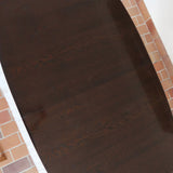 Table à manger Skovby en teck foncé avec plateau noir, piétement traîneau et deux rallonges, design danois des années 70.