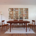 table à manger scandinave en teck massif extensible années 60 avec détails sculptés et rallonges intégrées