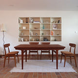 table à manger scandinave en teck massif extensible années 60 avec détails sculptés et rallonges intégrées