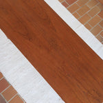 table basse scandinave en teck avec plateau bas repose magazines danemark années 60