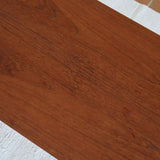 table basse scandinave en teck avec plateau bas repose magazines danemark années 60