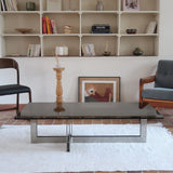 Table basse vintage en verre fumé, années 70, grand plateau rectangulaire à angles arrondis, piétement en inox brossé composé de deux cadres en U réunis par une croix centrale