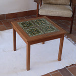 Table basse vintage en teck des années 60 avec plateau carré en céramique à motif.