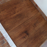 Table à manger vintage en chêne massif, pieds tournés à bobines, socle plein, plateau ouvrant central, art déco rustique esprit Charles Dudouyt