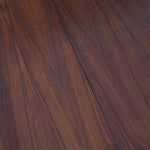 Table à manger ovale en teck avec deux rallonges intégrées, design scandinave des années 60, piètement central en bois.