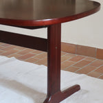 Table ovale à rallonges Farstrup en acajou foncé Danemark années 70, piétement traîneau double colonne sur patins arqués, 12 couverts