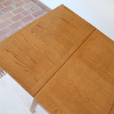 Table à manger scandinave extensible en chêne clair années 60, deux abattants intégrés, jusqu'à 12 couverts, pieds droits