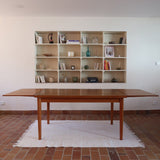 Table à manger scandinave extensible en teck années 60, allonges papillon latérales, pieds fuseau, jusqu'à 10 couverts