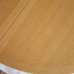 Table ronde extensible chêne Thygesen Sørensen Magnus Olesen années 70, pieds courbés sculptés, 2 rallonges