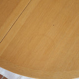 Table ronde extensible chêne Thygesen Sørensen Magnus Olesen années 70, pieds courbés sculptés, 2 rallonges