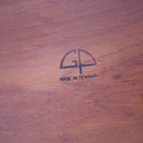 Table ronde extensible en teck massif Gudme Møbelfabrik Danemark années 60, pieds fuseau, label Danish Furniture Makers Quality Control