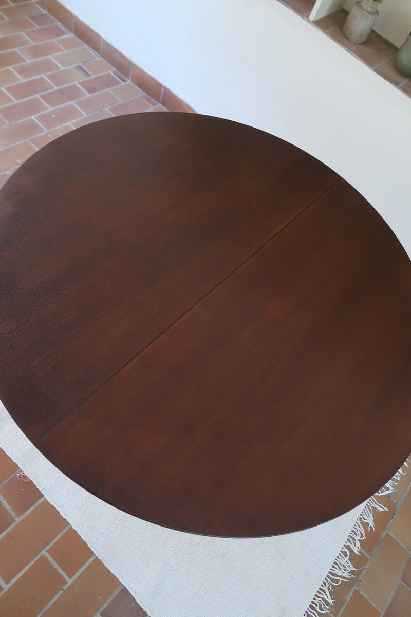Table ronde extensible Farstrup en palissandre années 70, pied central étoile, fabrication danoise, jusqu'à 10 couverts avec rallonge