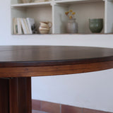 Table ronde extensible Farstrup en palissandre années 70, pied central étoile, fabrication danoise, jusqu'à 10 couverts avec rallonge